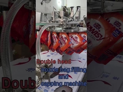 Máquina de preenchimento e tampa de sacos de bocal de cabeça dupla com saco pendurado para uma pessoa